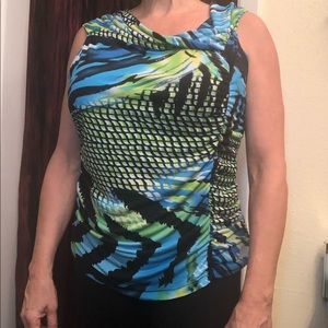 Gently worn Women’s top. Soft, breathable material